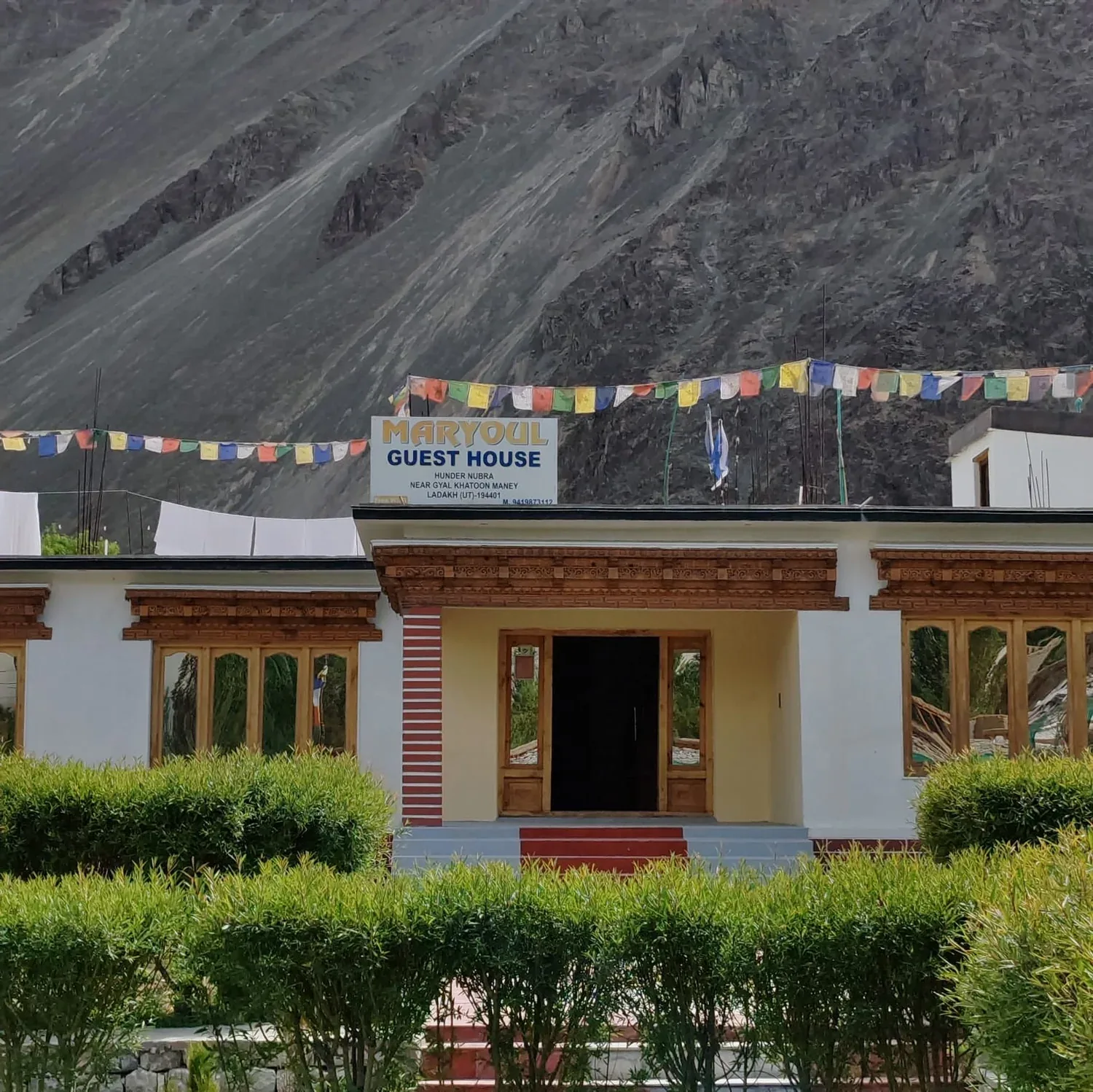 Maryoul Guest House facade and signboard